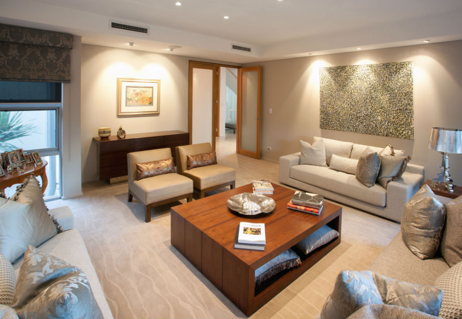 This Luxurious formal lounge is in tones of platinum, bronze and silver with custom cabinetry in walnut and polished chrome.